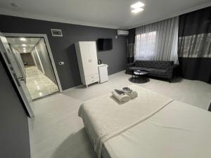 Postel nebo postele na pokoji v ubytování Arena Resort Otel Kagıthane