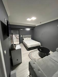 Postel nebo postele na pokoji v ubytování Arena Resort Otel Kagıthane