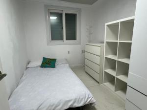 Postel nebo postele na pokoji v ubytování 안安 Stay 1914