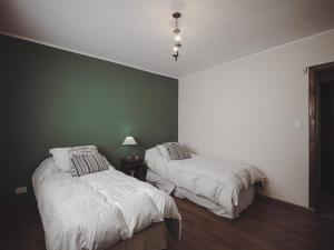 Ένα ή περισσότερα κρεβάτια σε δωμάτιο στο Bolivia Bed & Breakfast - by Me Nomad +8 φωτογραφίες