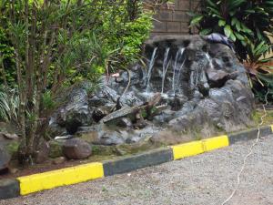 A garden outside The Gems Resort