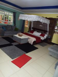 A bed or beds in a room at The Gems Resort