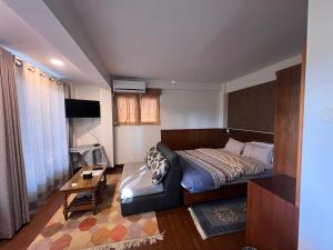Ένα ή περισσότερα κρεβάτια σε δωμάτιο στο Avocado Apartments +82 φωτογραφίες