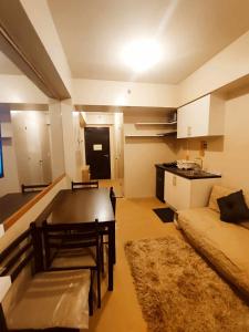 Posezení v ubytování Tower Four 1214 Avida Atria Iloilo
