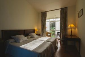Cama o camas de una habitación en La Posada