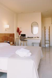 Apartamentos Buendia Suites - Torremolinos Centro客房内的一张或多张床位
