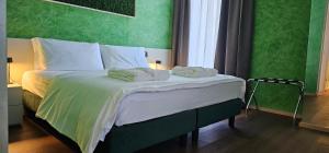 Postel nebo postele na pokoji v ubytování Roccaverde Hotel