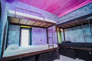 SANTA MARIA HOSTEL MUNROE ISLAND客房内的一张或多张床位