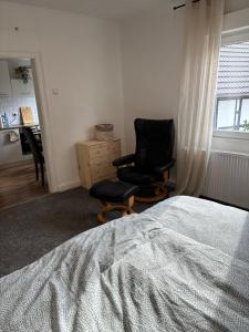 Postel nebo postele na pokoji v ubytování Gemütliche 2 Zimmer Wohnung in bester Lage