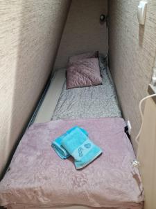 Giường trong phòng chung tại Apartman-Diva-Vukovic