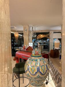 Apartamentos Buendia Suites - Torremolinos Centro的休息区