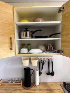 O bucătărie sau chicinetă la Apt Casa De Parco 1BR With WiFi, Pool & Netflix by Damaresa