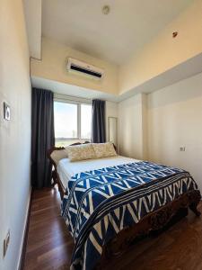 Un pat sau paturi într-o cameră la Apt Casa De Parco 1BR With WiFi, Pool & Netflix by Damaresa