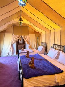 Postel nebo postele na pokoji v ubytování Original Luxury Camp