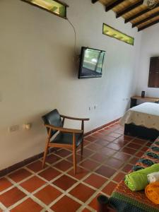 TV a/nebo společenská místnost v ubytování Hotel Campestre Villa Nico