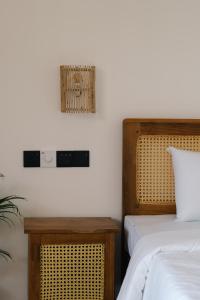 Postel nebo postele na pokoji v ubytování Sansun Guesthouse