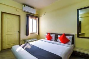 Dwaraka Lodging 객실 침대