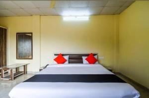Dwaraka Lodging 객실 침대