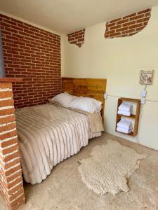 Postel nebo postele na pokoji v ubytování Casa Nikko
