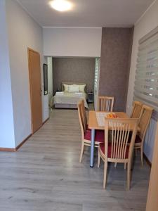 Posteľ alebo postele v izbe v ubytovaní Sobe Apartmani Svitlana