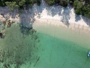 an aerial view of a beach and the ocean at Phu Aunna in Ko Phayam