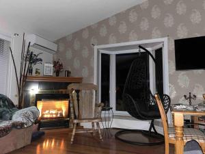 Μια τηλεόραση ή/και κέντρο ψυχαγωγίας στο Chalet à la Baie Boudreault