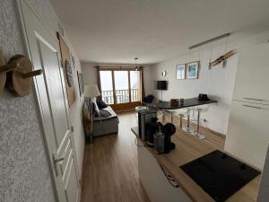 Posedenie v ubytovaní Appartement 2 pièces, les Chalets de Super-Besse