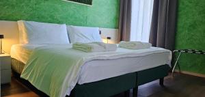 Postel nebo postele na pokoji v ubytování Roccaverde Hotel