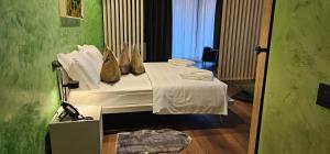 Postel nebo postele na pokoji v ubytování Roccaverde Hotel