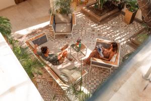 an overhead view of two people sitting in a room at Cartagena Royal Hotel Boutique in Cartagena de Indias