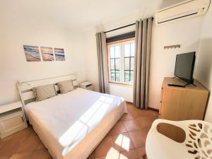 Televisyen dan/atau pusat hiburan di Sunny Haven Alvor