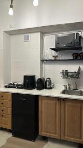 Kuchyňa alebo kuchynka v ubytovaní Apartment 17 Warsaw