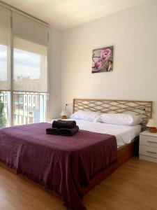 En eller flere senge i et værelse på Prime holiday apartment + 22 billeder