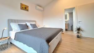 Ένα ή περισσότερα κρεβάτια σε δωμάτιο στο Villa DaLi Pomer +31 φωτογραφίες