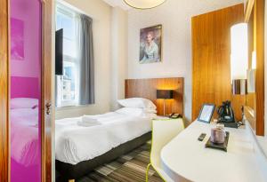 Voodi või voodid majutusasutuse The Place Hotel toas