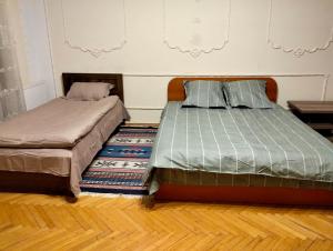Voodi või voodid majutusasutuse Long Tree Hostel - Comfy Mattress toas