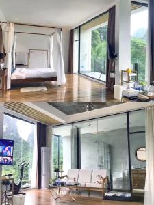 un soggiorno con divano e una camera con finestre di Yangshuo 1Q84 Boutique Hotel a Yangshuo