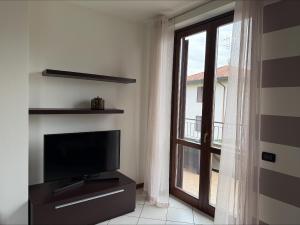 TV a/nebo společenská místnost v ubytování La Casa di Teo