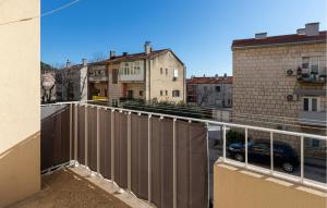 a balcony with a view of a street and buildings at 1 Bedroom Lovely Apartment In Ploce in Ploče