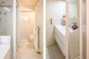 Koupelna v ubytování Elena Apartment - Free Secure Parking - Center - Pool - View Lake