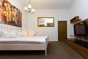 Ένα ή περισσότερα κρεβάτια σε δωμάτιο στο ContaApart