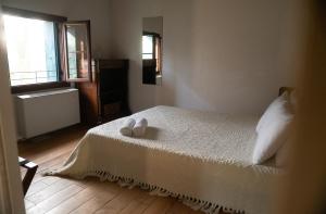 Katil atau katil-katil dalam bilik di Agriturismo Barchessa