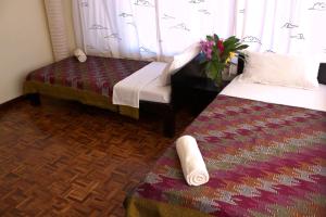 Voodi või voodid majutusasutuse Dondrub Guest House toas