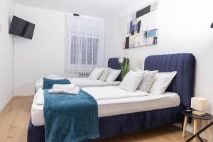 Postel nebo postele na pokoji v ubytování Apartman Tihana