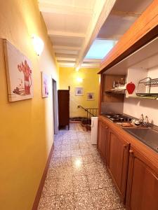 Kuchyňa alebo kuchynka v ubytovaní Appartamenti a Pitigliano