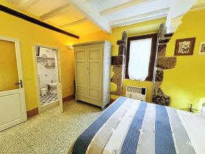 Posteľ alebo postele v izbe v ubytovaní Appartamenti a Pitigliano