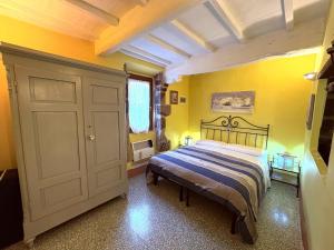 Posteľ alebo postele v izbe v ubytovaní Appartamenti a Pitigliano