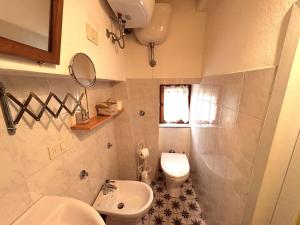 Kúpeľňa v ubytovaní Appartamenti a Pitigliano
