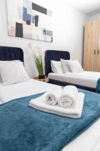 Postel nebo postele na pokoji v ubytování Apartman Tihana