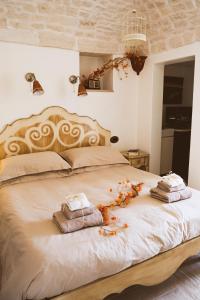 Łóżko lub łóżka w pokoju w obiekcie Savito Guest House